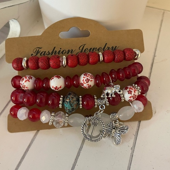 4 pack fashion bracelets with Anchor, Elephant and Butterfly Charm NWT - Picture 1 of 1